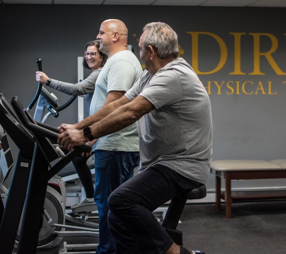 3 patients using exercise equipment in yonkers PT office